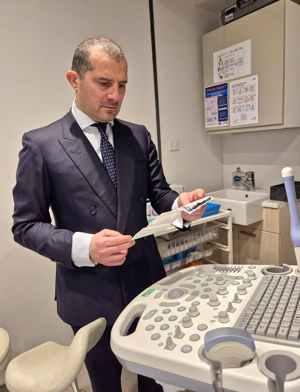 Dr Simone Rofena reviewing a scan — recurrent miscarriage and implantation failure assessment